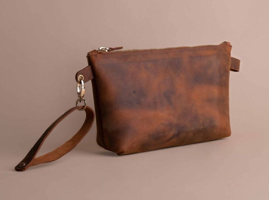 brown leather clutch purse