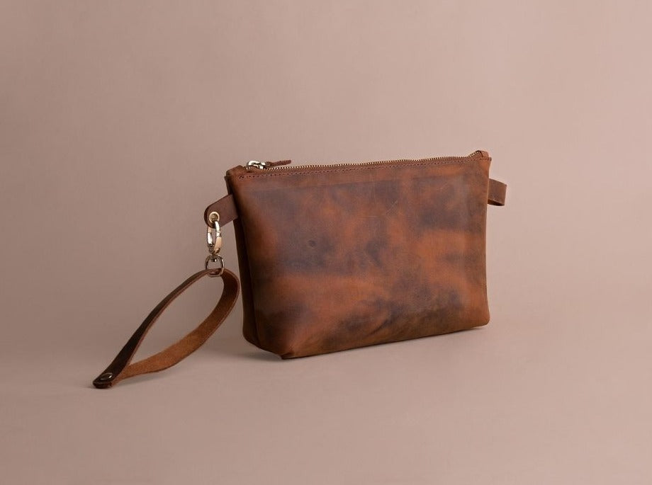 brown leather clutch purse