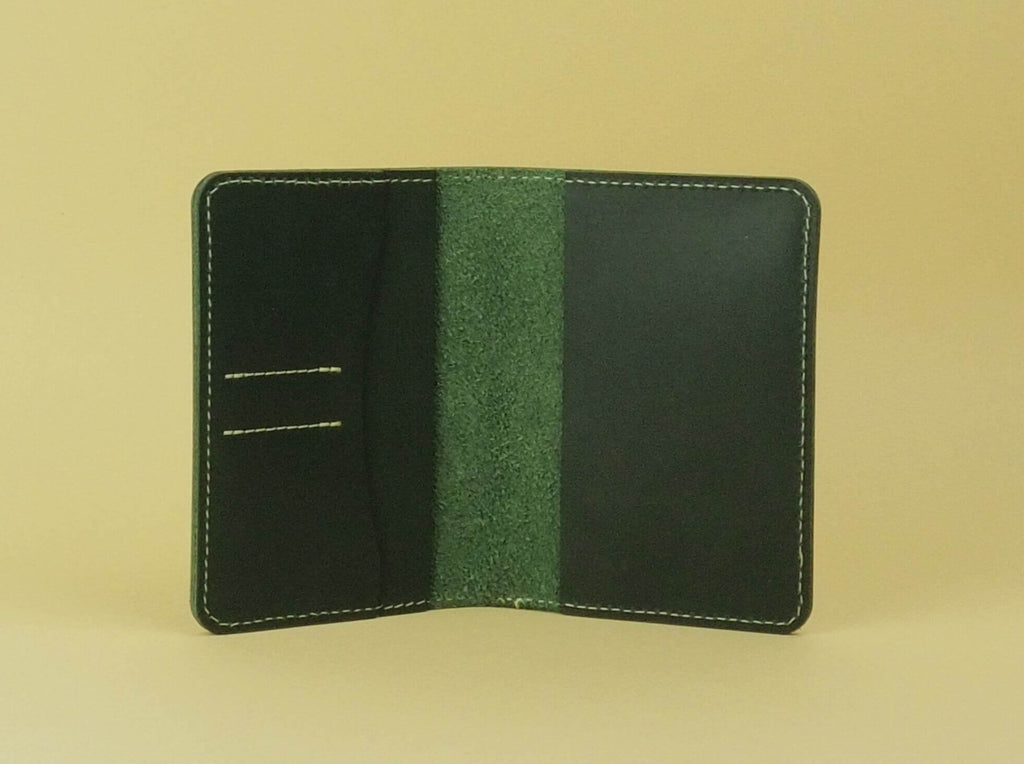green leather passport case